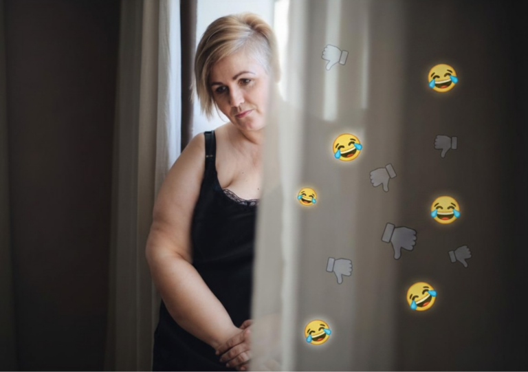 Frau wirkt nachdenklich durch Bodyshaming und verletzende Reaktionen in sozialen Medien